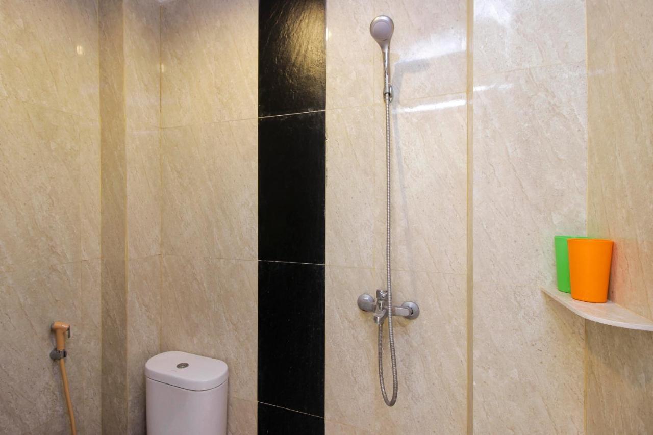 Отель Reddoorz Near Jalan Jendral Sudirman Манадо Экстерьер фото